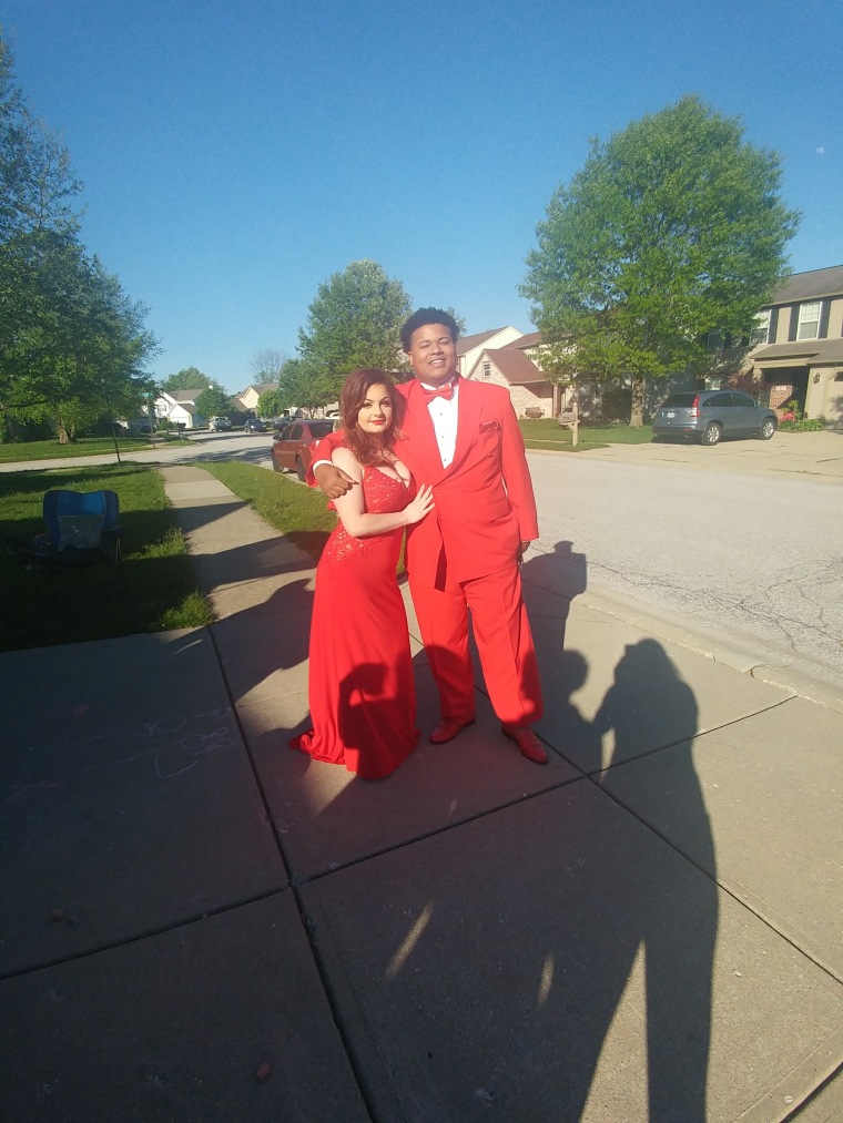 Red suit prom