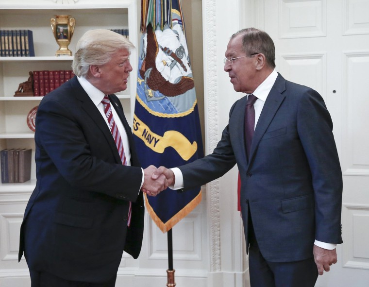 Image: President Donald Trump shakes hands with Russian Foreign Minister Sergey Lavrov