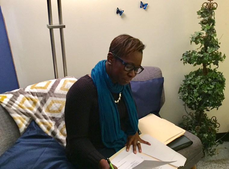 Image: Rape Counselor DeVona Alleyne works in her office on the west side of Chicago