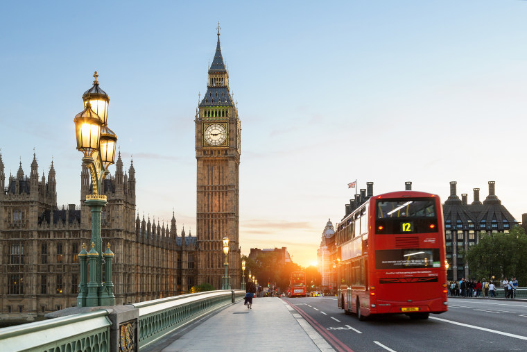 Image: A bus on Westminster Bridge with Big Ben in the background in London