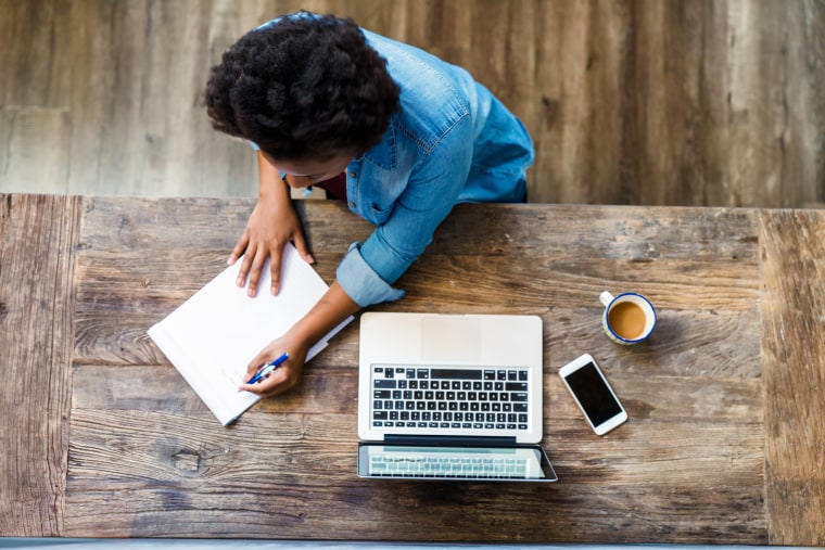 Image: Overhead view of a woman using a computer