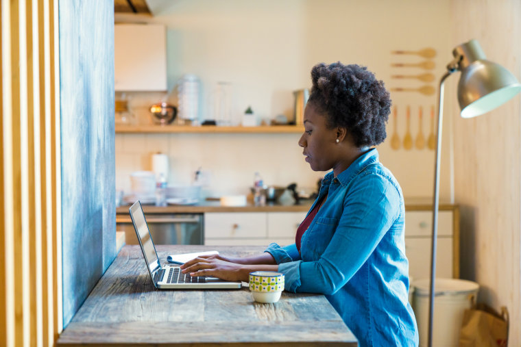 Image: Young woman studying at home