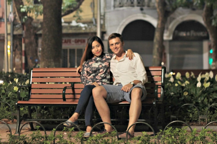 Austin Klemmer poses with Huyen Nguyen after he proposed to her in November 2015 in Hanoi, Vietnam. The couple married in a civil ceremony in 2016.