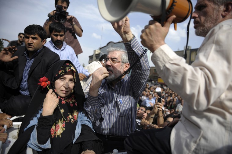 Image: Mir Hossein Mousavi addresses supporters as he attends a rally in June 2009