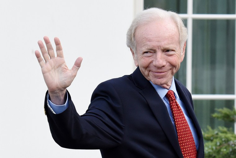 Image: Joe Lieberman leaves the West Wing of the White House