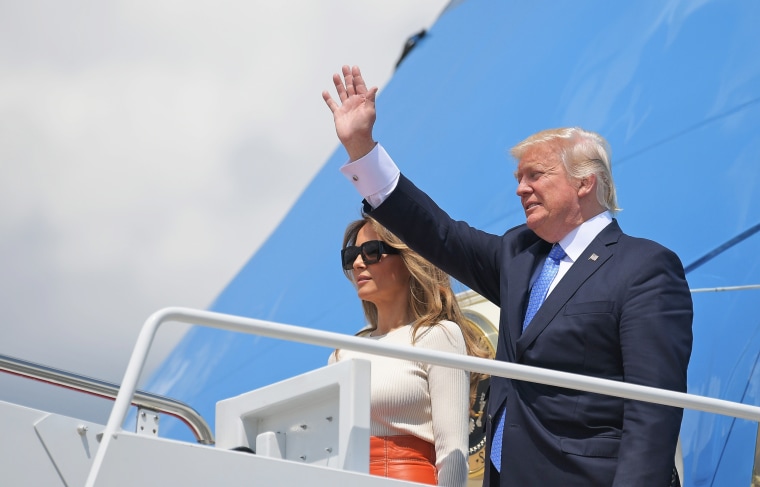 Image: US President Donald Trump and First Lady Melania Trump make their way to board Air Force One