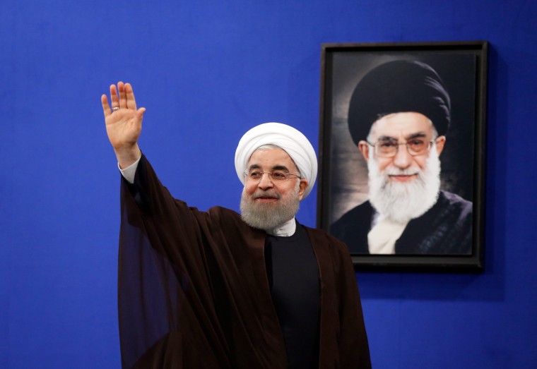 Image: Iranian President Hassan Rouhani gestures during a televised speech after his election victory in Tehran