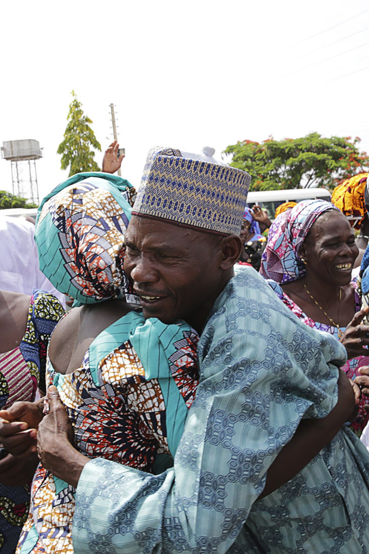 Image: A family is reunited with the released Chibok girls in Abuja