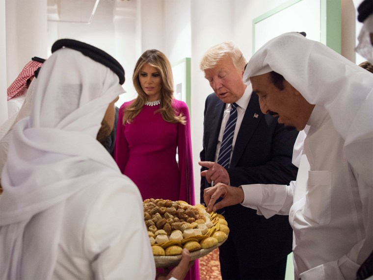 Image: Trump and first lady Melania Trump are welcomed by Saudi Arabia's King Salman bin Abdulaziz Al Saud at Al Murabba Palace in Riyadh
