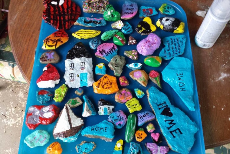 Rock painting groups connect families, communities