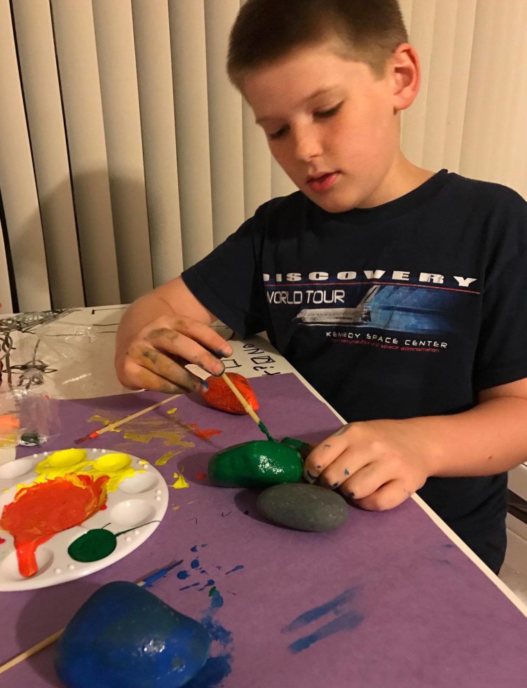 Carrie Cerve, a moderator of the Brevard County, Florida rock group says her son, Elijah, 10, loves to paint, hide and find rocks.