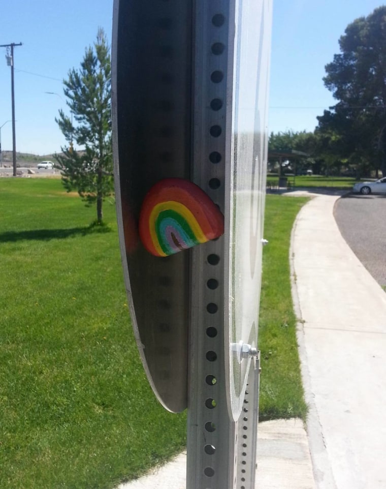 A rainbow rock painted and hidden by Brandy Phillips' children.