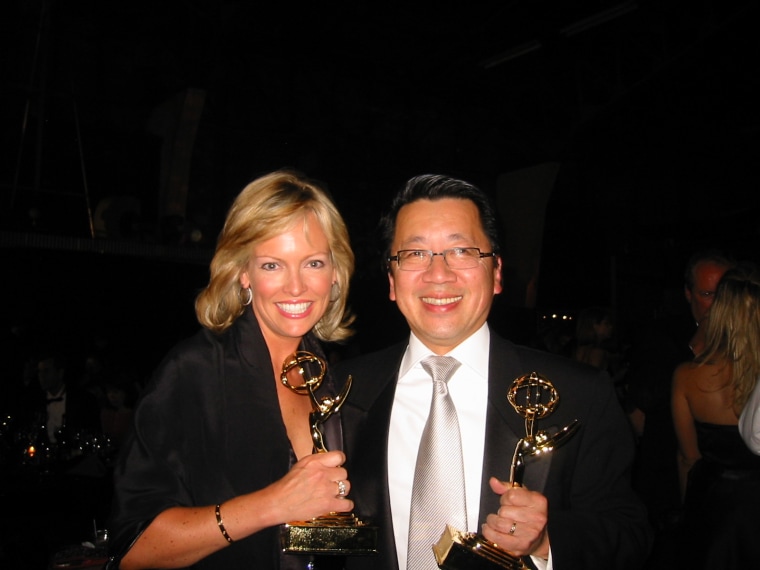 Bay Area journalists Julie Haener and Ben Fong-Torres with Emmys for hosting the San Francisco Chinese New Year Parade in 2004.