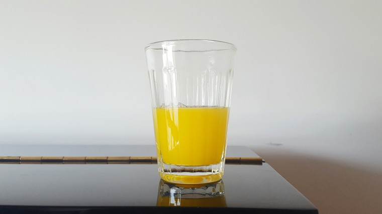 Orange Juice On Table At Home