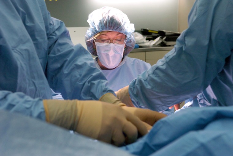 Image: Dr. Marci Bowers performs the transgender operation on a patient at Mount San Rafael Hospital in Trinidad, Colorado.