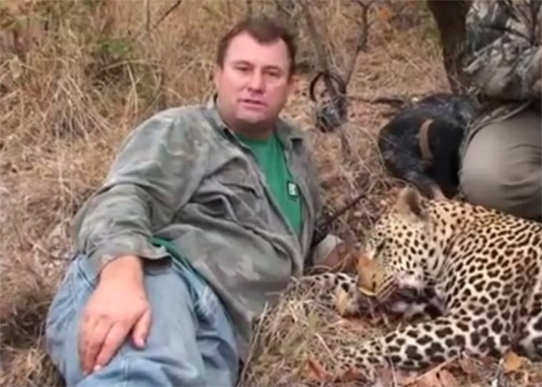 Image: Hunter Theonis Botha with a leopard