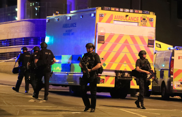 Image: Armed police officers at Manchester Arena after reports of an explosion.