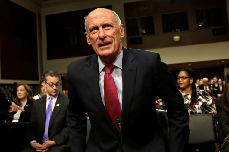 Image: Director of National Intelligence Dan Coats arrives to testify