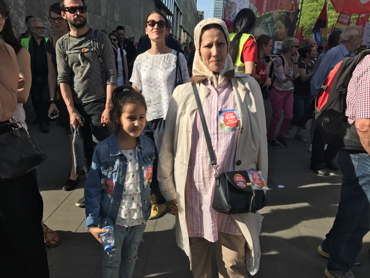 Image: Malika Bali and her granddaughter at the rally