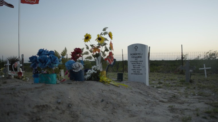  The grave of Maurico Vidaurri's father, Roberto, in the family cemetery.  