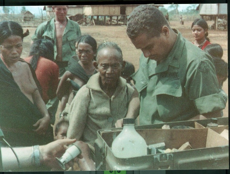 File photo of Puerto Rican military doctor, Dr. Ernesto Gonzalez, administering vaccines in Vietnam.