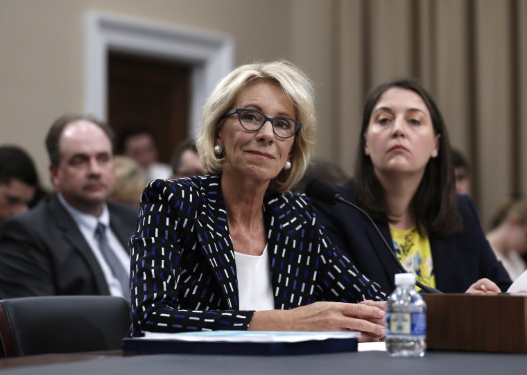 Image: Betsy DeVos and Erica Navarro  on Capitol Hill in Washington