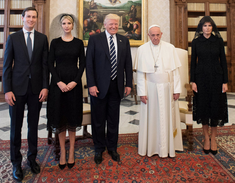 Image: Pope Francis poses with U.S. President Donald Trump his wife Melania, Jared Kushner and Ivanka Trump during a private audience at the Vatican