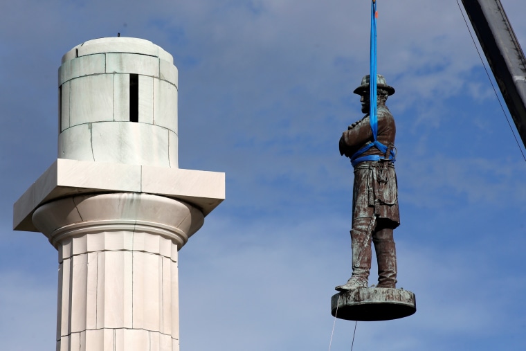 Image: A monument of Robert E. Lee, who was a general in the Confederate Army, is removed in New Orleans