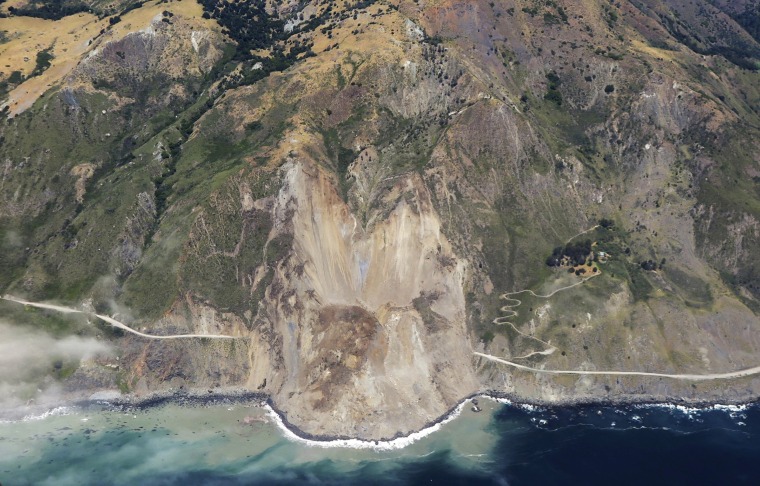 Image: A massive landslide along California's coastal Highway 1 buries the road under a 40-foot layer of rock and dirt
