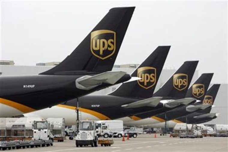 United Parcel Service aircraft are loaded with air containers full of packages bound for their final destination at the UPS Worldport All Points International Hub