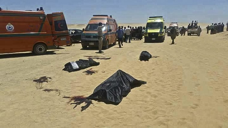 Image: Bodies of victims killed when gunmen stormed a bus in Minya, Egypt
