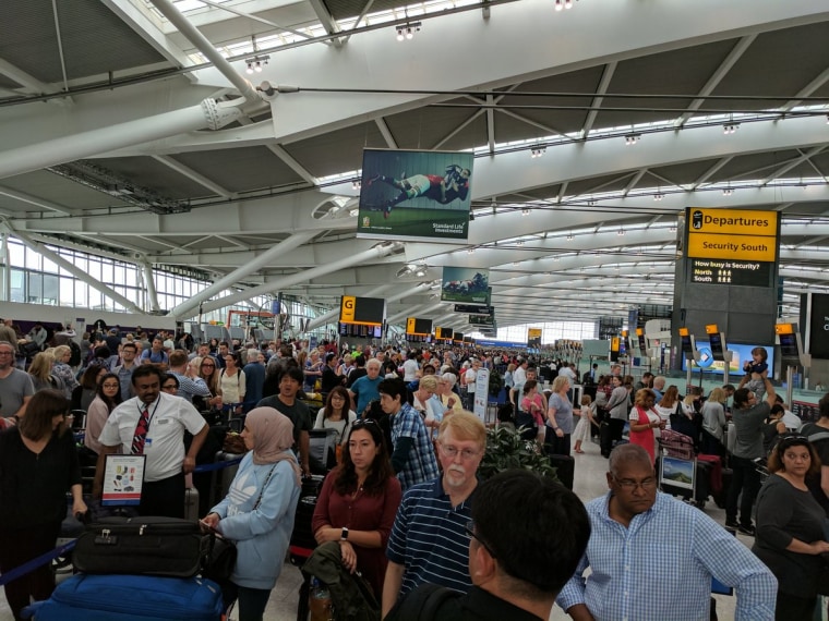 Image: There were long check-in lines at Heathrow's Terminal 5 because of the British Airways computer systems failure.