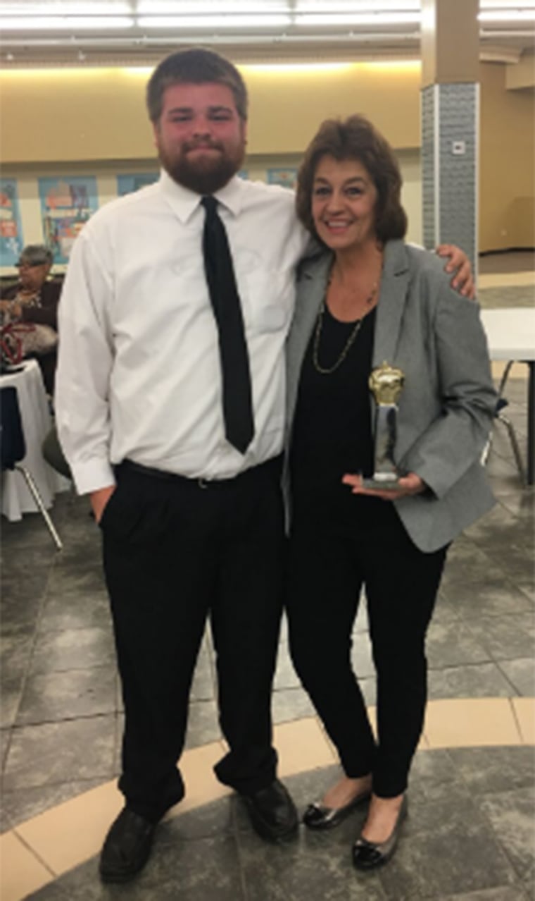 Jackie Lewis won the East Mississippi/West Alabama Golden Apple Teacher of the Year award and she could nominate a student to receive a $2,500 scholarship and laptop. She nominated Hunter Mollett and took him as her guest.