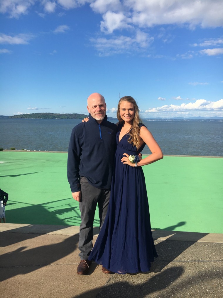 Meg Sullivan with her dad before her senior prom this spring.