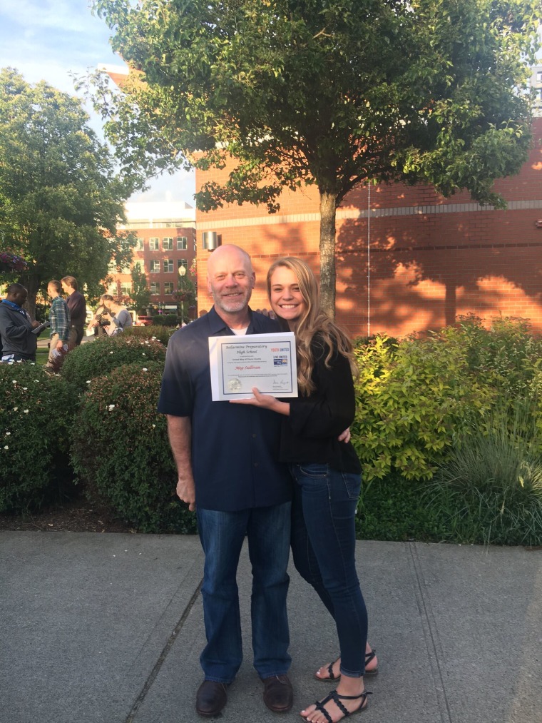 Meg Sullivan with her dad, Tom, at a scholarship awards ceremony last month.