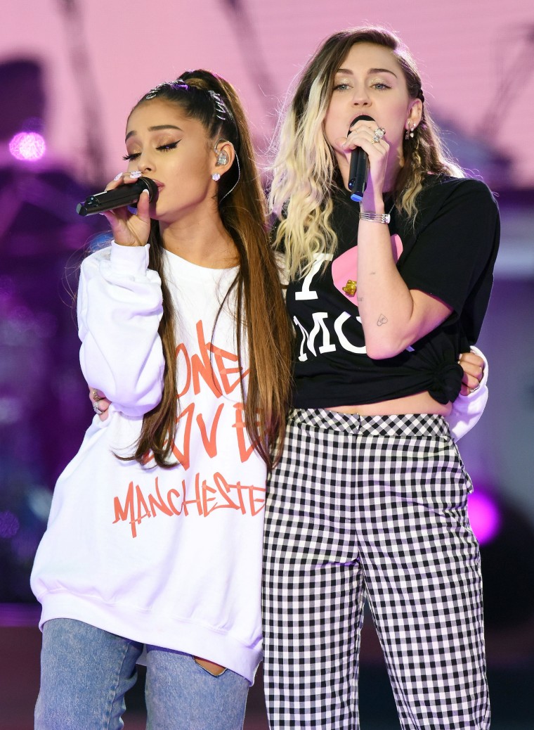 Ariana Grande and Miley Cyrus perform during the One Love Manchester benefit concert for the victims of the Manchester Arena terror attack in Britain