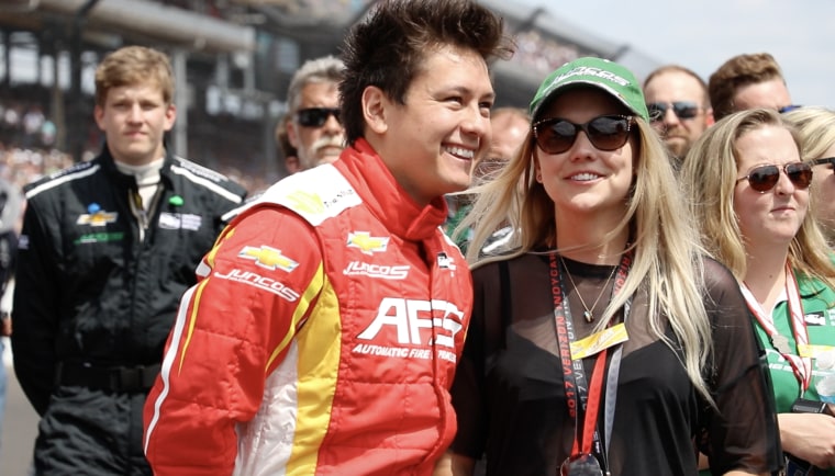 Sebastian Saavedra stands next to his wife, Jane Saavedra before the race at the Indy500 on Sunday May 28th, 2017.