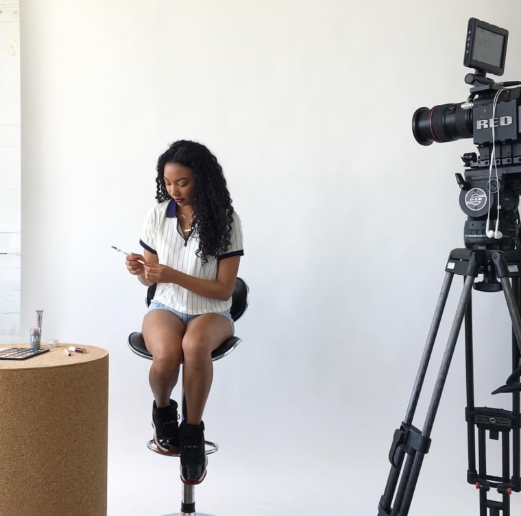 Asia Jackson shooting a video for her YouTube channel.