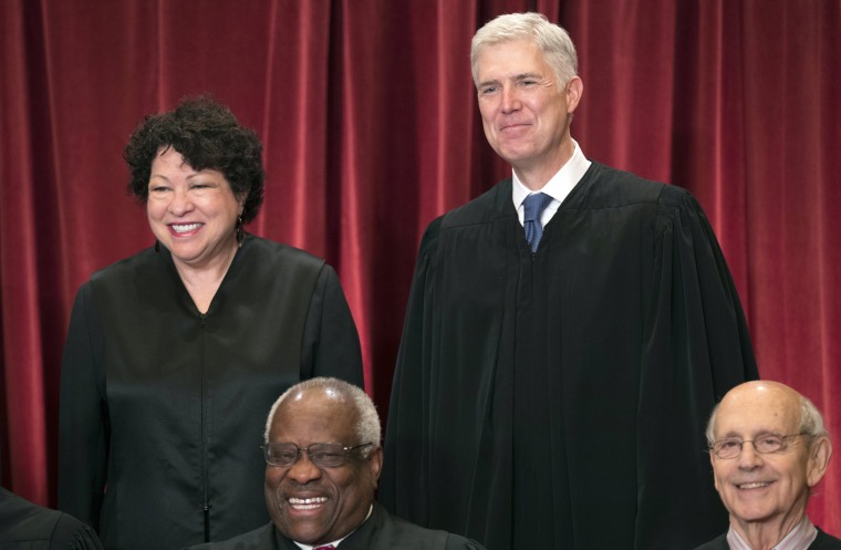 Image: Supreme Court Justices Sonia Sotomayor and Neil Gorsuch pose for a group portrait