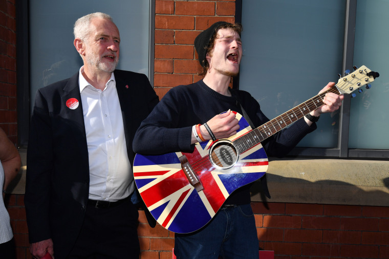 Image: Labour Party leader Jeremy Corbyn meets busker Dan Hetfield in Manchester