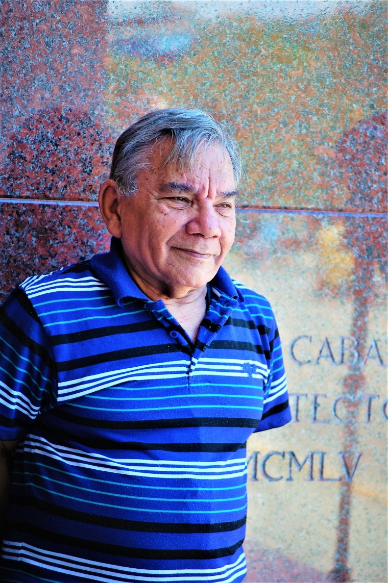 Tomás Fernández Robaina, a scholar on Afro-Cuba history, stands in front of the National Library.