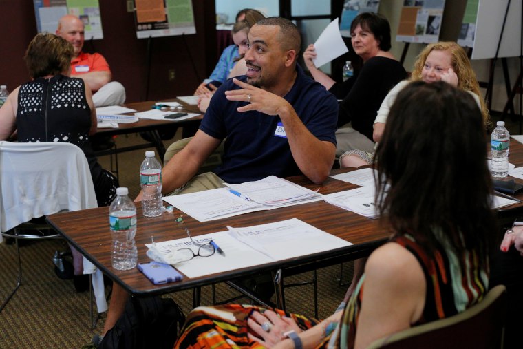 Image: High school math teacher Chris Johnson speaks during a training session with the group History Unerased in Lowell