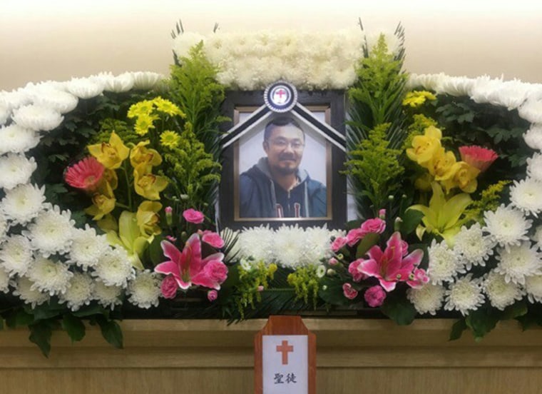 A portrait of Phillip Clay displayed at his funeral in South Korea.