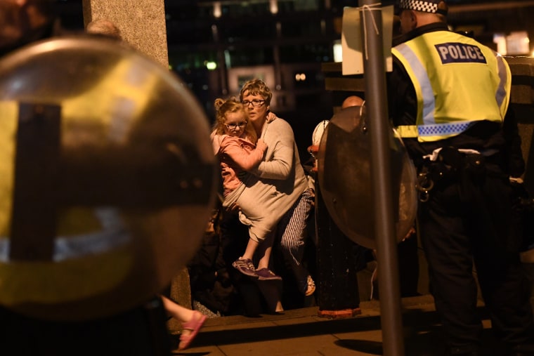 Image: People are lead to safety on Southwark Bridge away from London Bridge after an attack on June 3, 2017 in London, England. Police responded to reports of a van hitting pedestrians on London Bridge in central London.