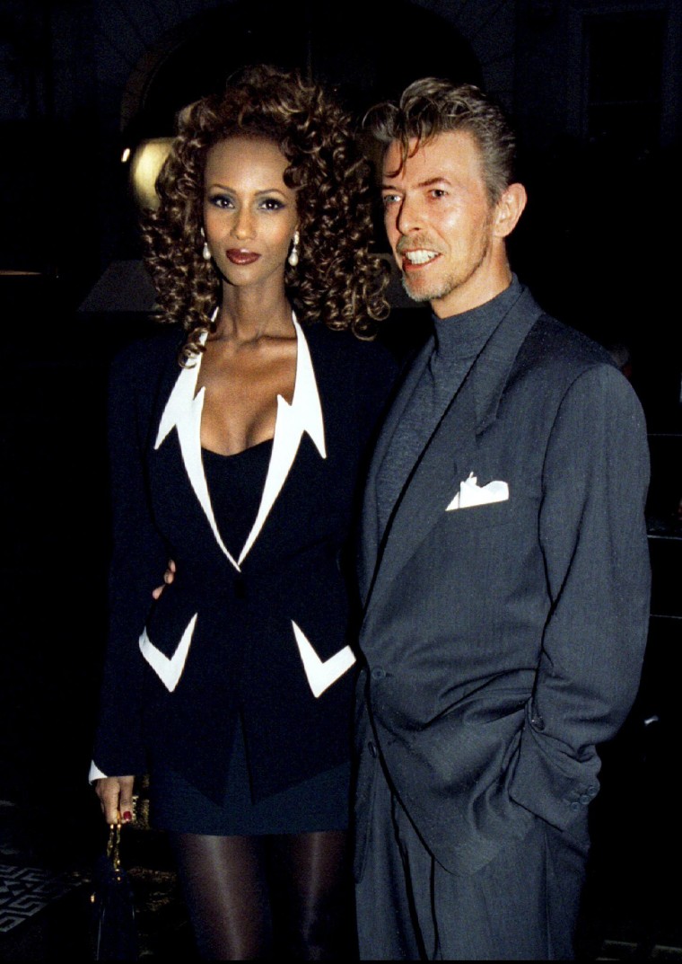 Image: File photo of David Bowie and his wife Iman arriving for the launching of a new art magazine at the Fine Art Society's Mayfair gallery in London