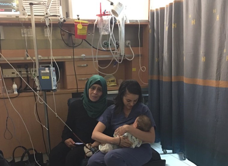 Israeli nurse Ola Ostrowski-Zak breastfed a Palestinian baby after a car accident left his mother unconscious
