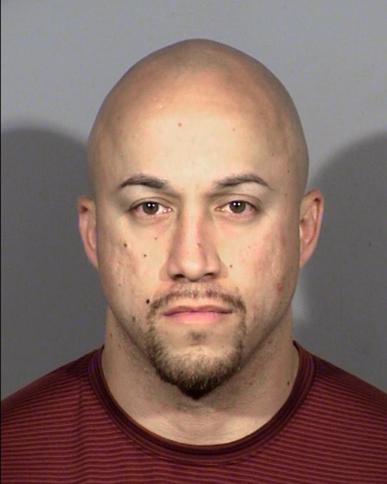 Image: This undated photo provided by Clark County Detention Center shows Las Vegas police officer Kenneth Lopera.