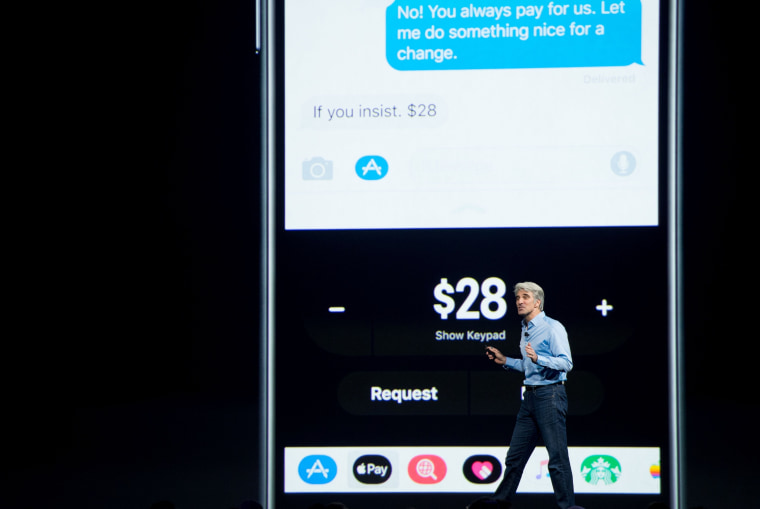 Image: Apple's Senior Vice President of Software Engineering Craig Federighi speaks about Apple Pay