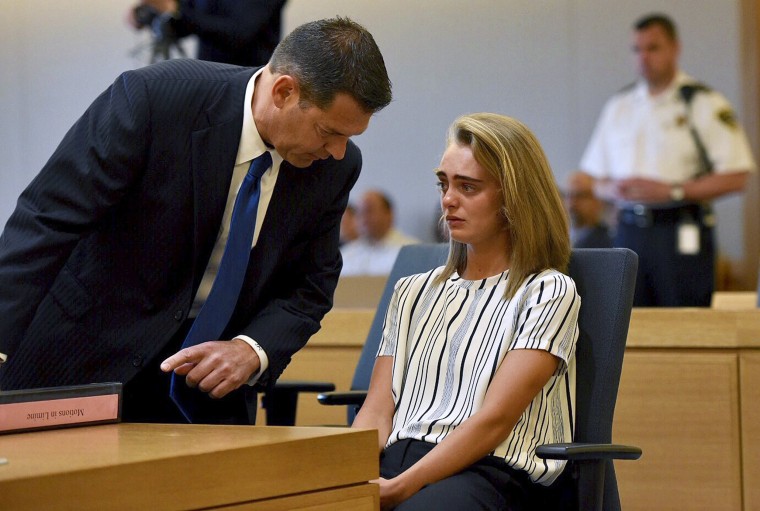 Image: Attorney Joseph Cataldo talks to his client, Michelle Carter at Taunton Juvenile Court