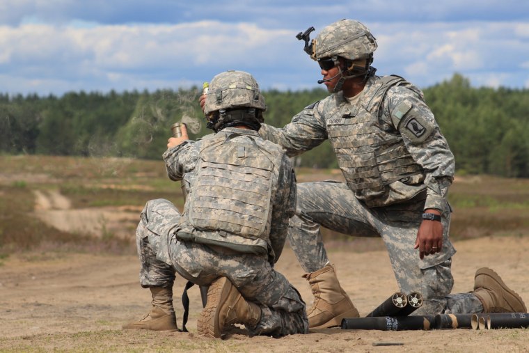 Image: Mortar gunners fire mortar rounds